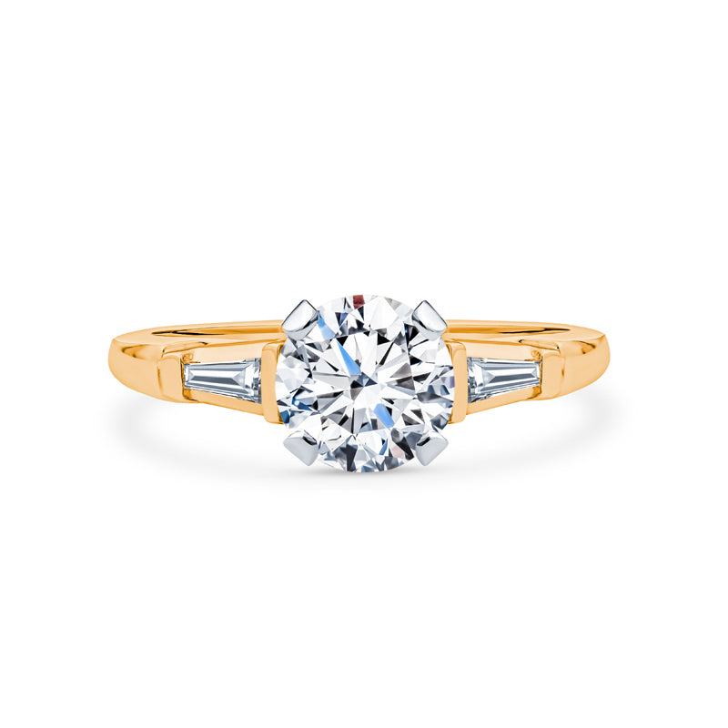 Three Stone Engagement Ring with Tapered Baguette