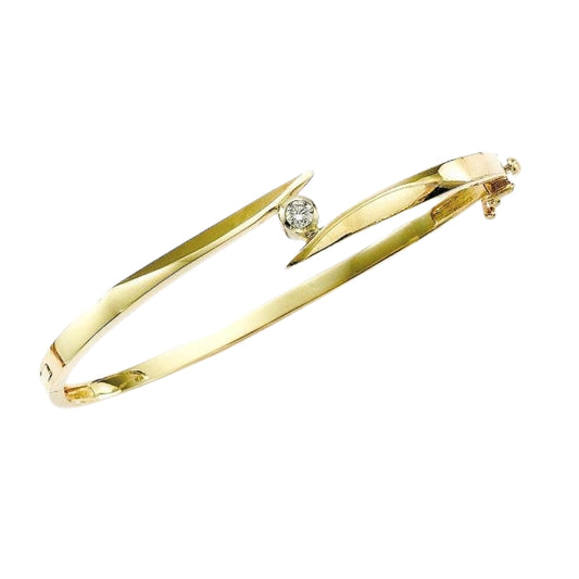 solitaire diamond bangle, two tone diamond bangle, mixed metal solitaire bangle